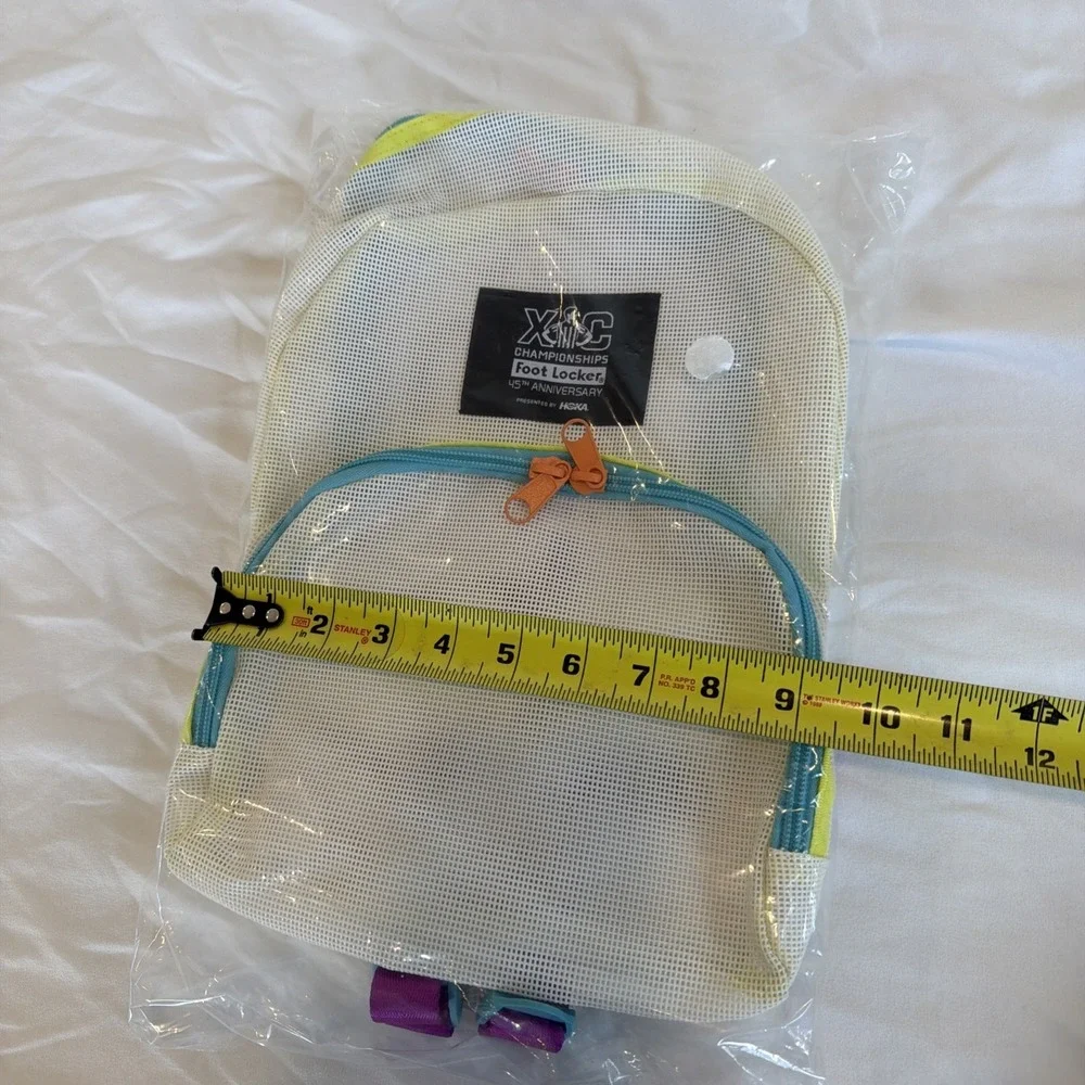 HOKA Foot Locker XC Championship White Colorblock Mesh Backpack Bag